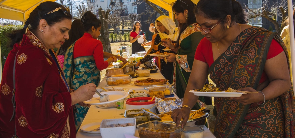 Participants savouring the variety of cuisine from different States in India.